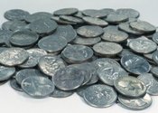 Main_thumb_14758458-pile-of-quarters-coins-on-grey-background